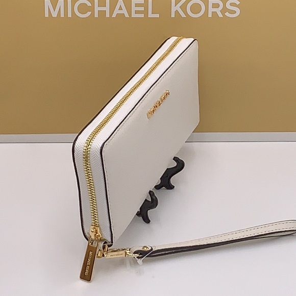 MICHAEL KORS LARGE TRAVEL CONTINENTAL WRISTLET WALLET OPTIC WHITE COLOR - Picture 4 of 16